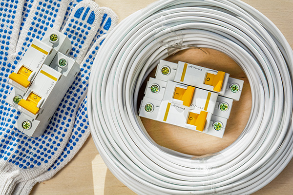 automatic-switches-lie-on-gloves-next-to-the-coil-2024-03-05-21-14-41-utc