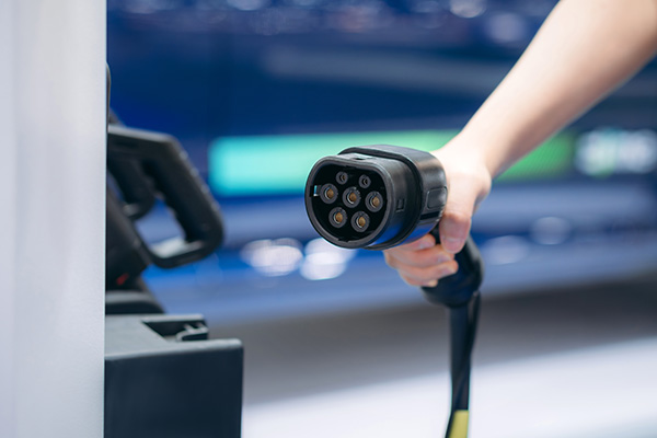 close-up-ev-charging-at-station-eco-and-clean-ene-2023-11-27-05-27-47-utc